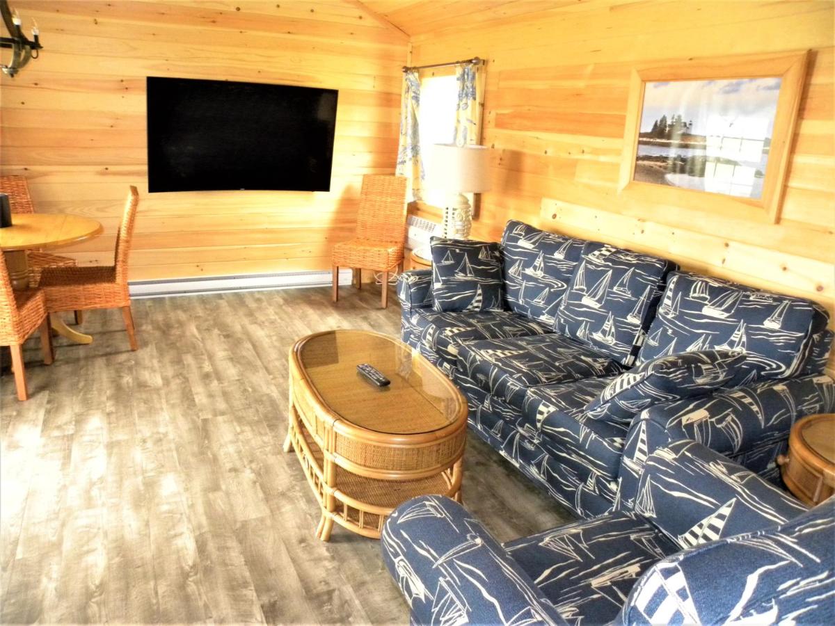 Deluxe One Bedroom Cottage with King Bed and Sea View at Colonial Gables Oceanfront Village