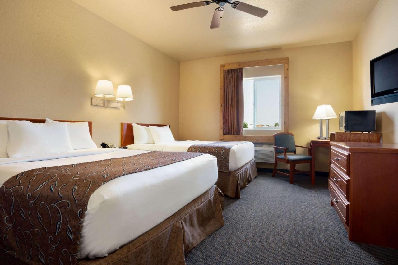 Queen Room with Two Queen Beds - Non-Smoking at Travelodge by Wyndham Gillette