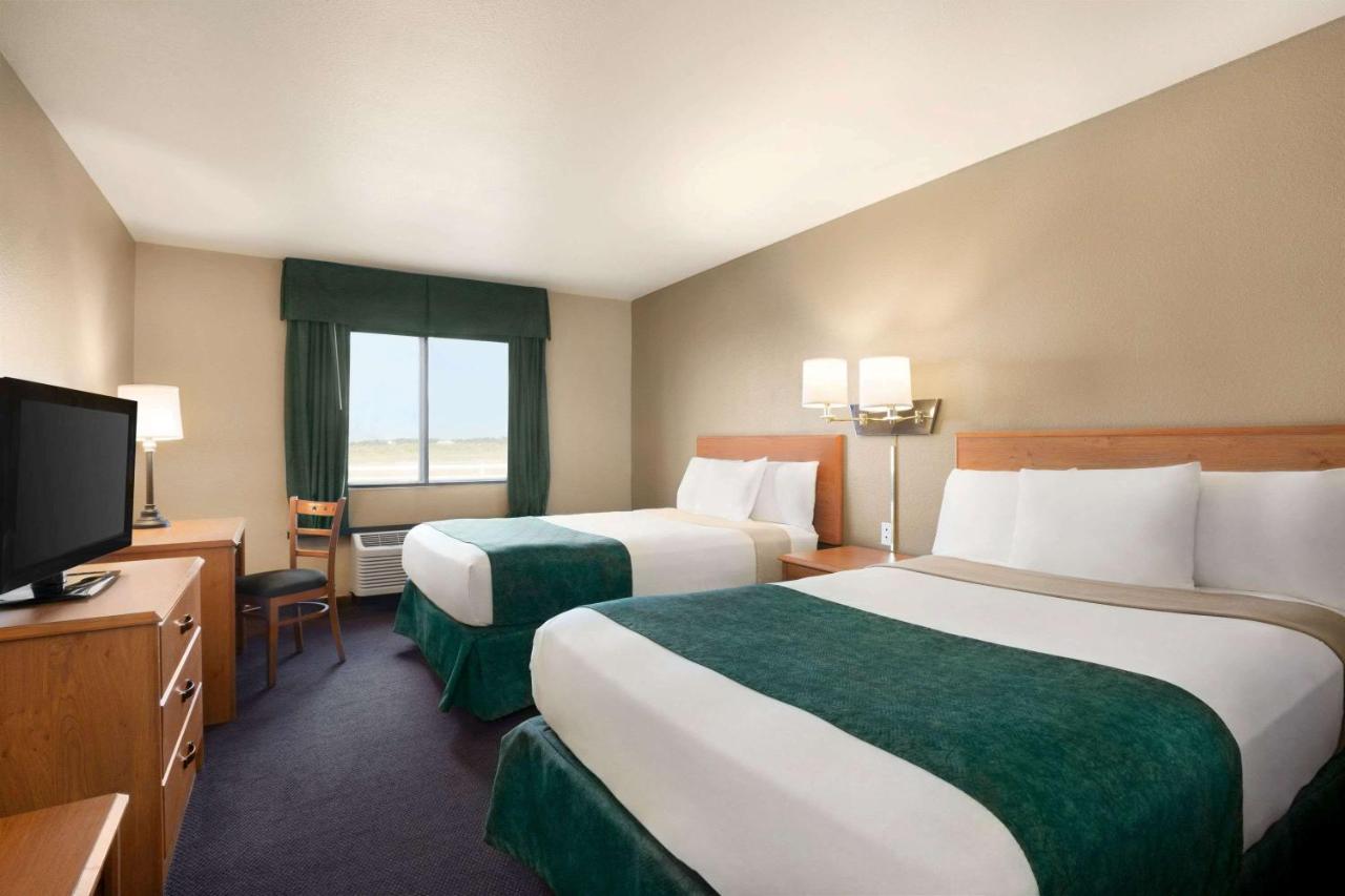 Queen Room with Two Queen Beds - Mobility Access/Non-Smoking at Travelodge by Wyndham Pecos