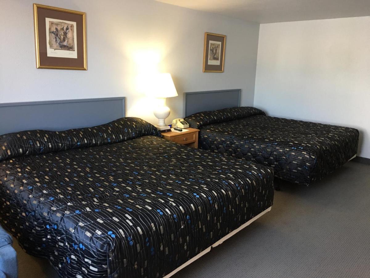King Room with Two King Beds at Americas Best Value Inn Billings