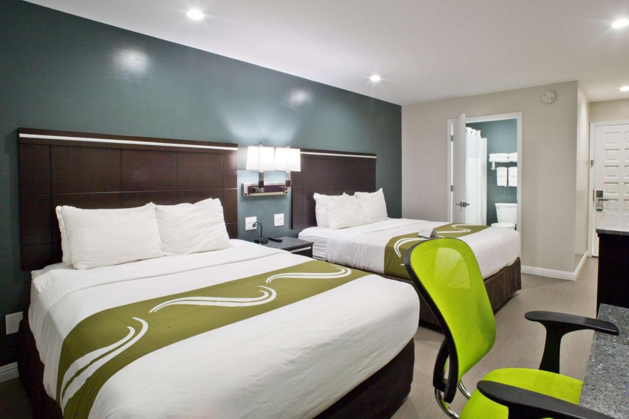 Queen Room with Two Queen Beds - Non-Smoking at Bay Area Inn & Suites