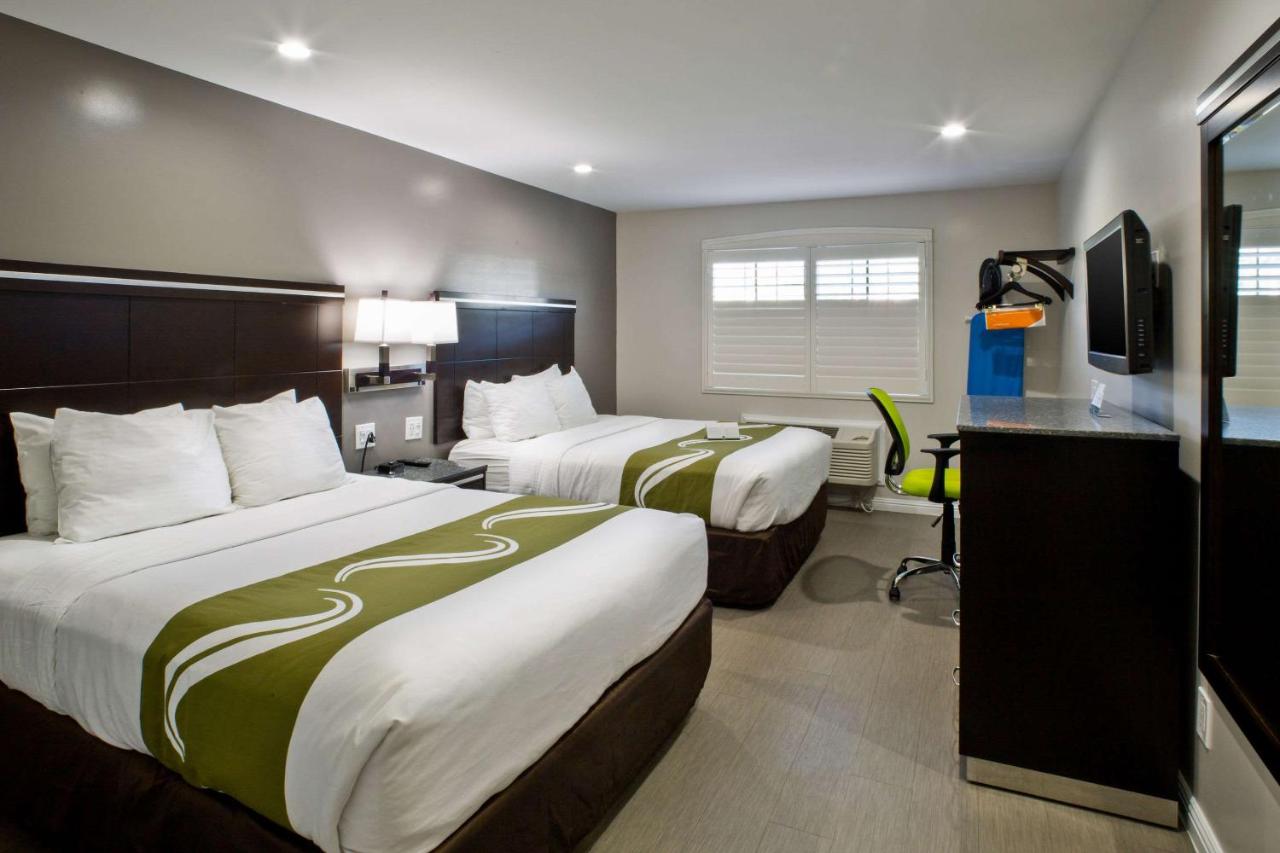 Queen Room with Two Queen Beds - Non-Smoking at Bay Area Inn & Suites