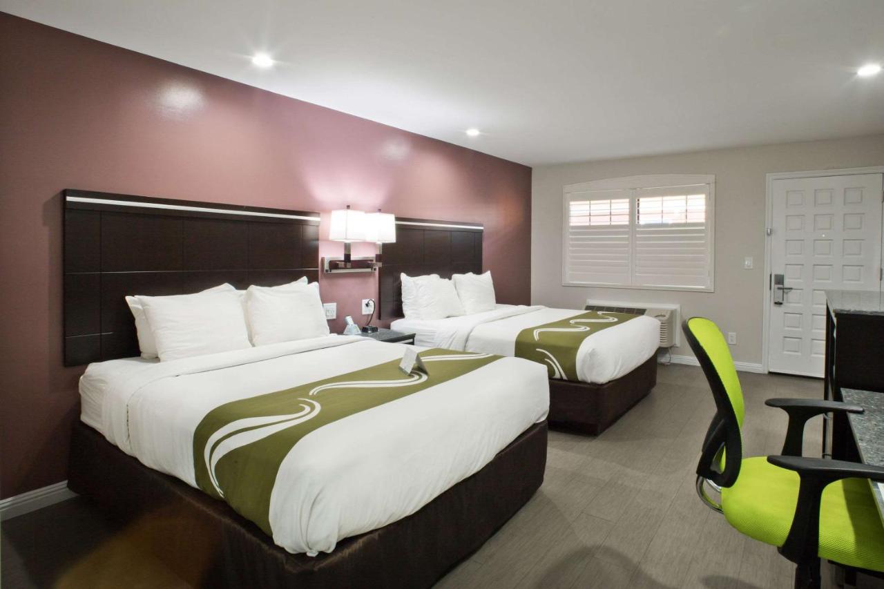 Queen Room with Two Queen Beds - Non-Smoking at Bay Area Inn & Suites