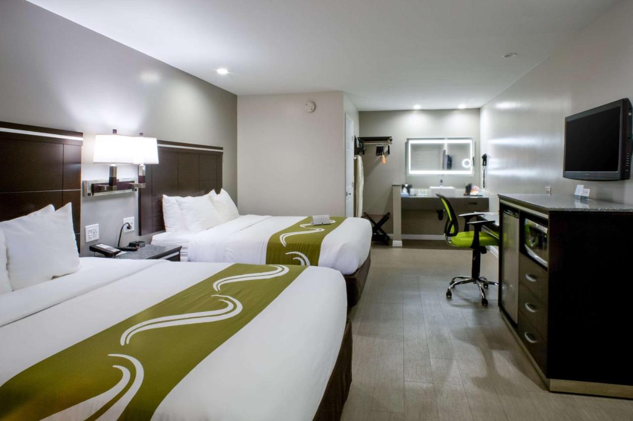 Queen Room with Two Queen Beds - Non-Smoking at Bay Area Inn & Suites