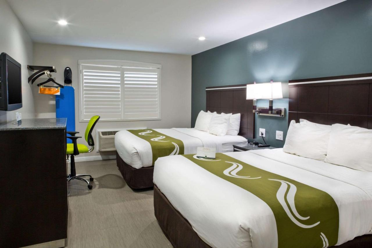 Queen Room with Two Queen Beds - Non-Smoking at Bay Area Inn & Suites