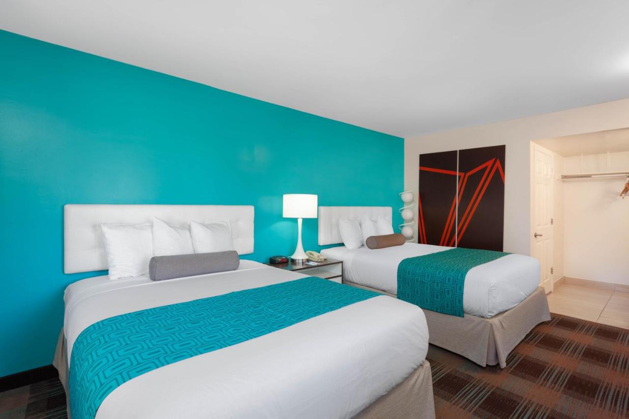 Queen Room with Two Queen Beds at Howard Johnson by Wyndham San Diego Hotel Circle