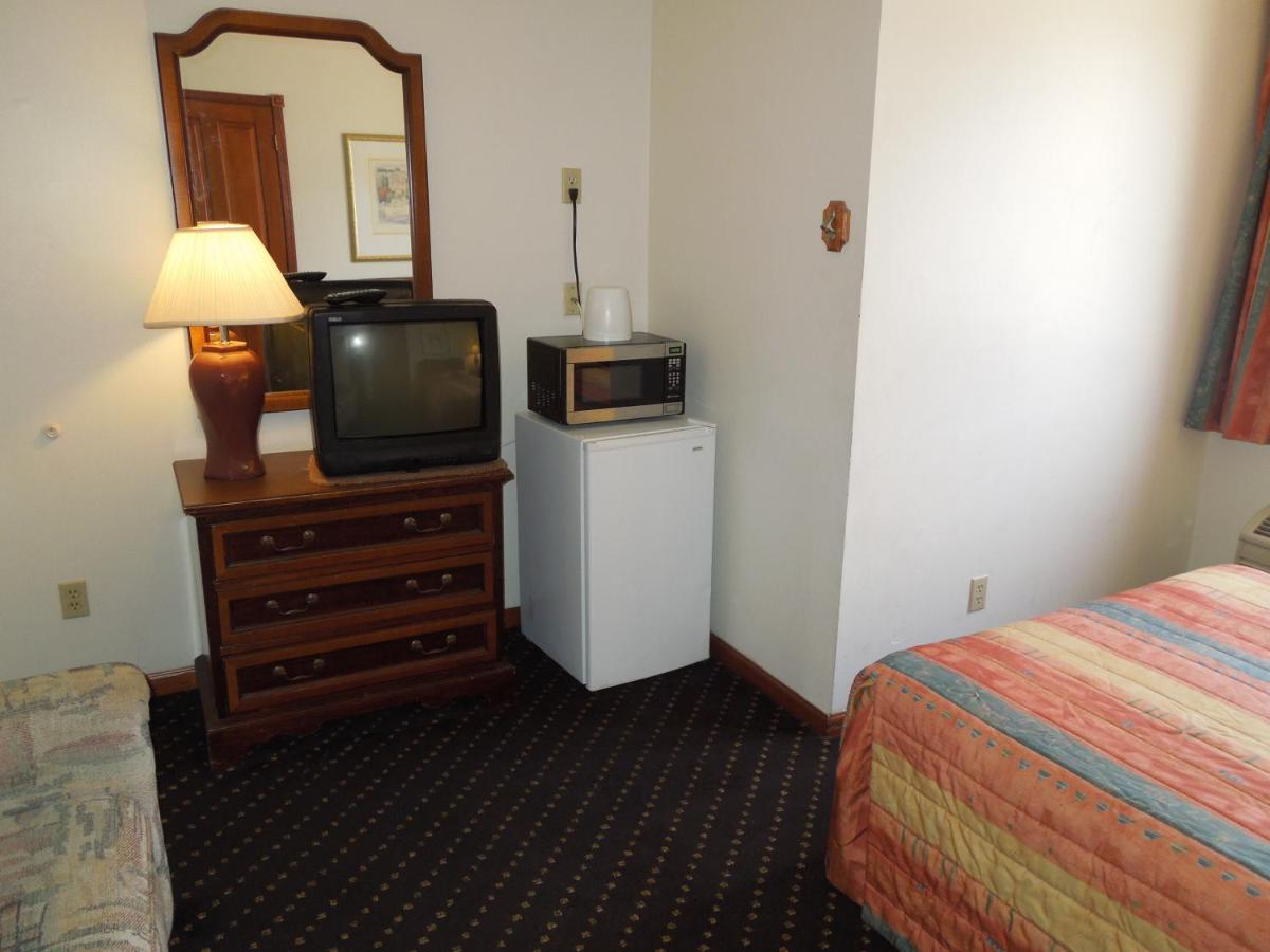 Deluxe Room with Sofa bed at Calypso Boutique Hotel