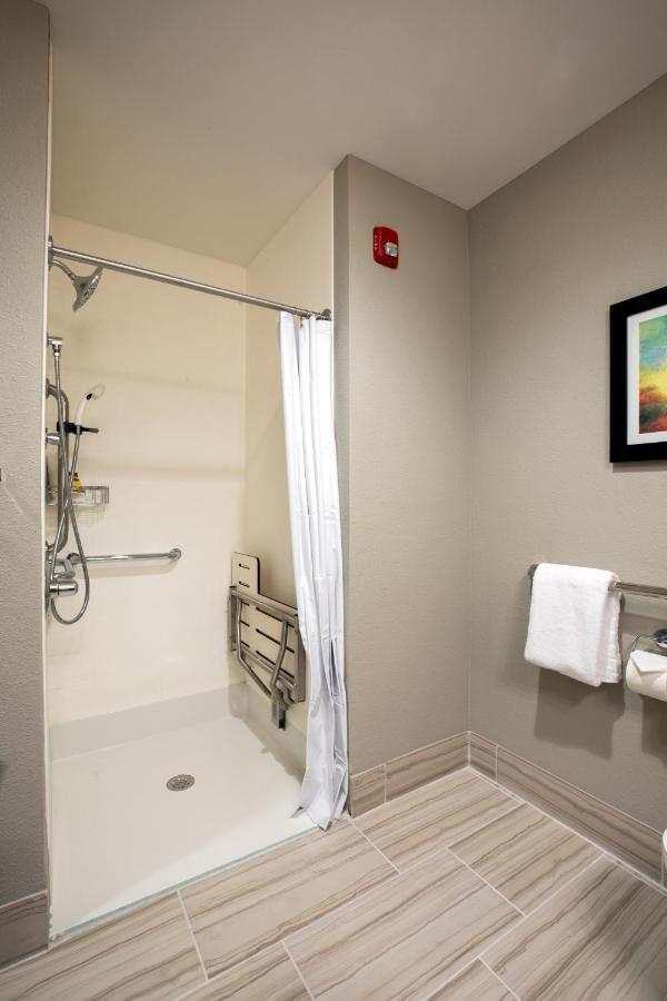 Queen Suite with Two Queen Beds and Roll-in Shower - Disability Access at StoneHill Lawrence, Trademark Collection by Wyndham