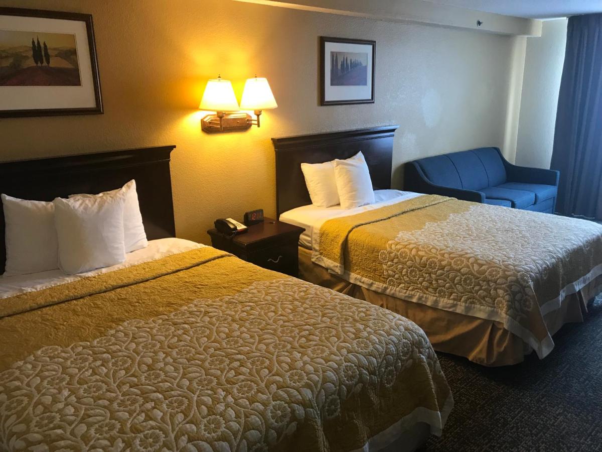 Deluxe Queen Room with Two Queen Beds - Non-Smoking at Days Inn & Suites by Wyndham Tucker/Northlake