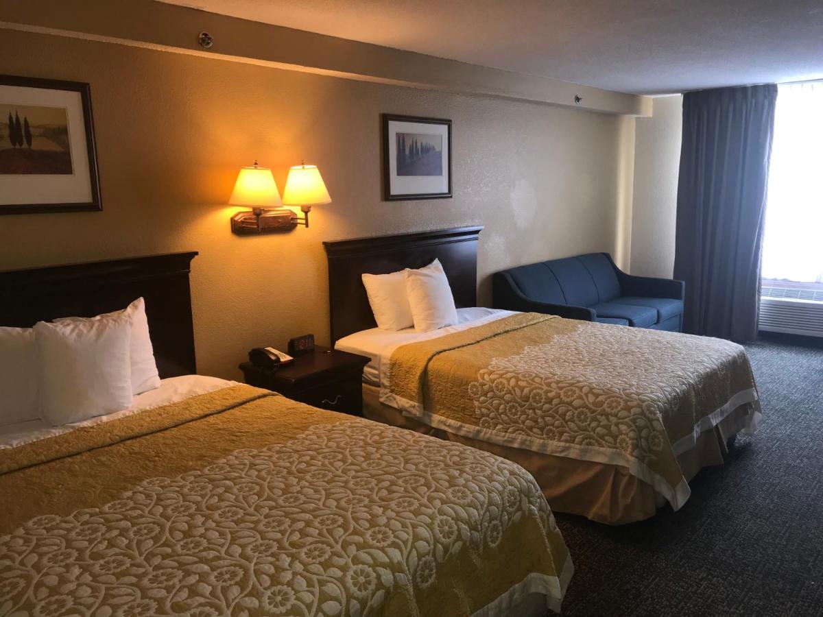 Deluxe Queen Room with Two Queen Beds - Non-Smoking at Days Inn & Suites by Wyndham Tucker/Northlake