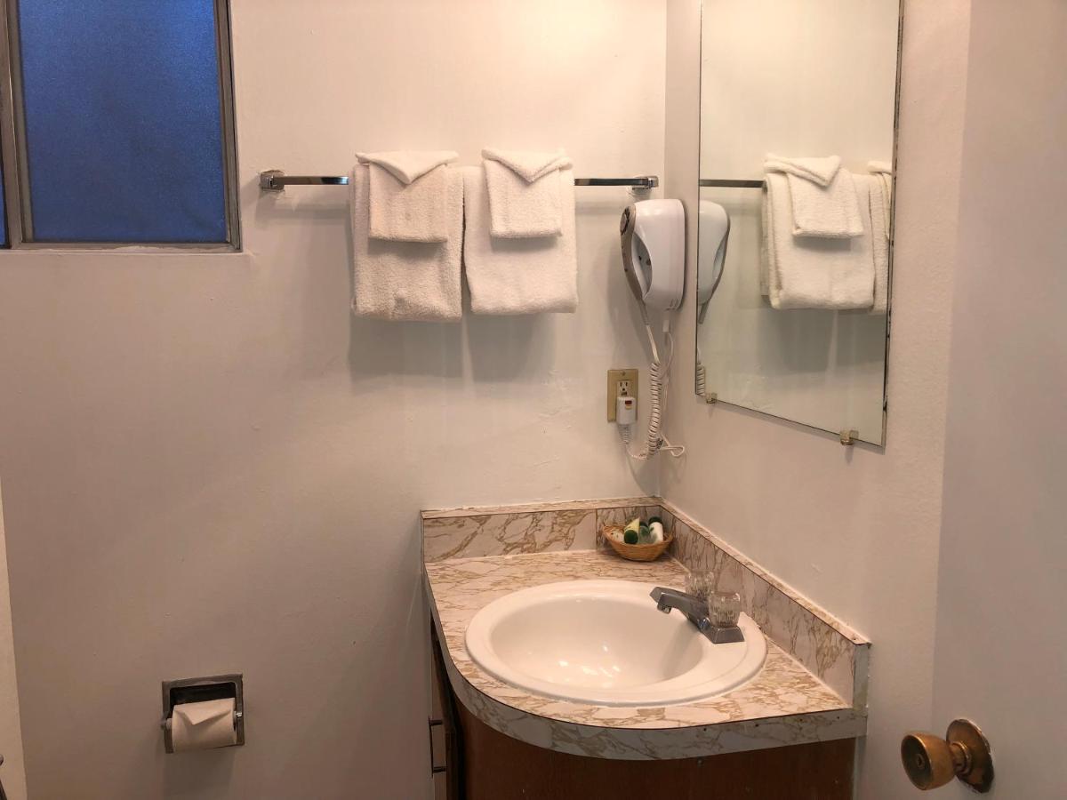 Double Room with Two Double Beds at Cedar Inn & Suites