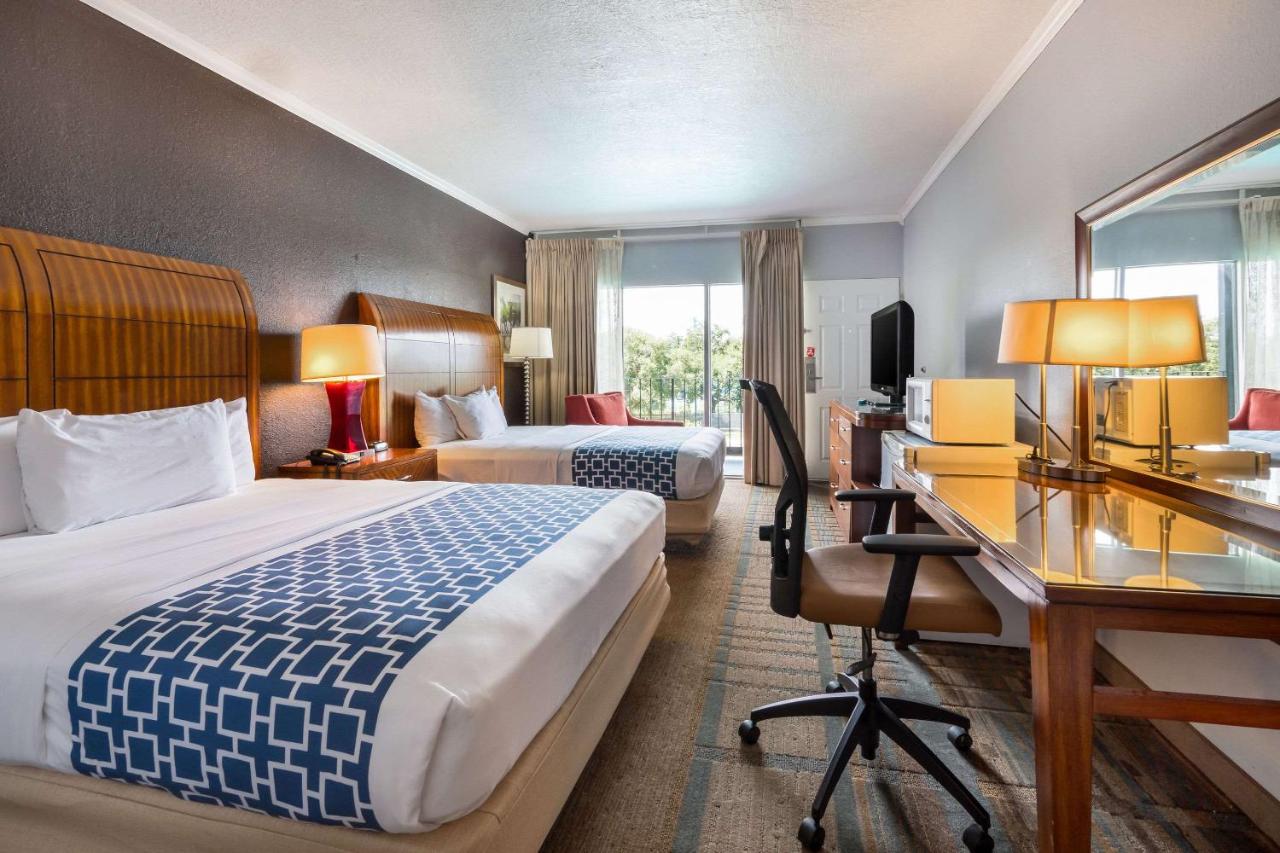 Queen Room with Two Queen Beds and Pool View - Non-Smoking at Econo Lodge Winter Haven Chain Of Lakes