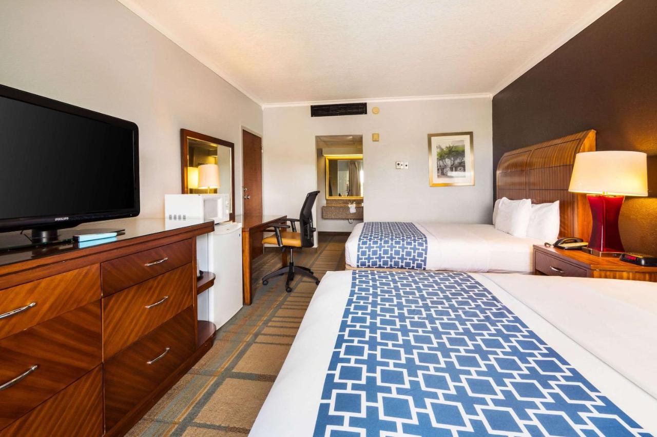 Queen Room with Two Queen Beds and Pool View - Non-Smoking at Econo Lodge Winter Haven Chain Of Lakes