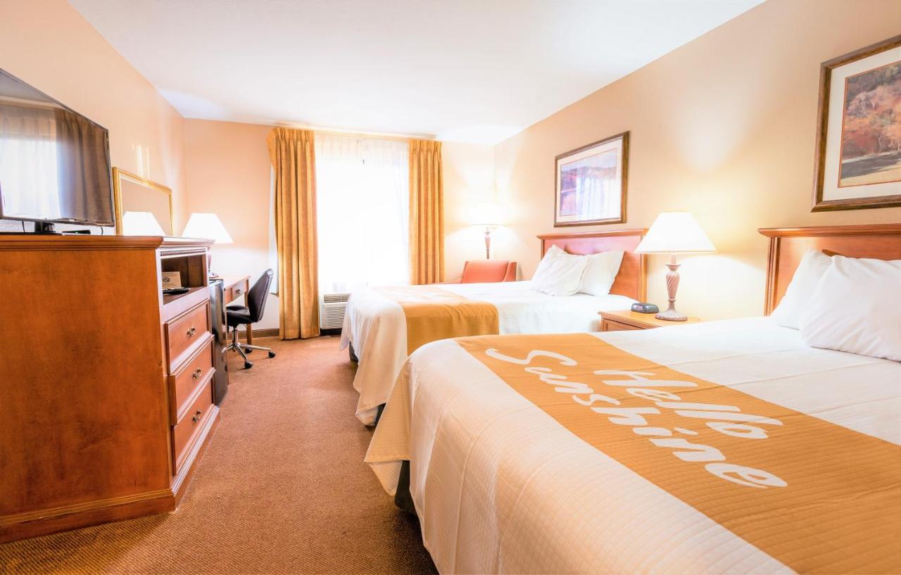 Deluxe Queen Room with Two Queen Beds at Days Inn & Suites by Wyndham Cuba