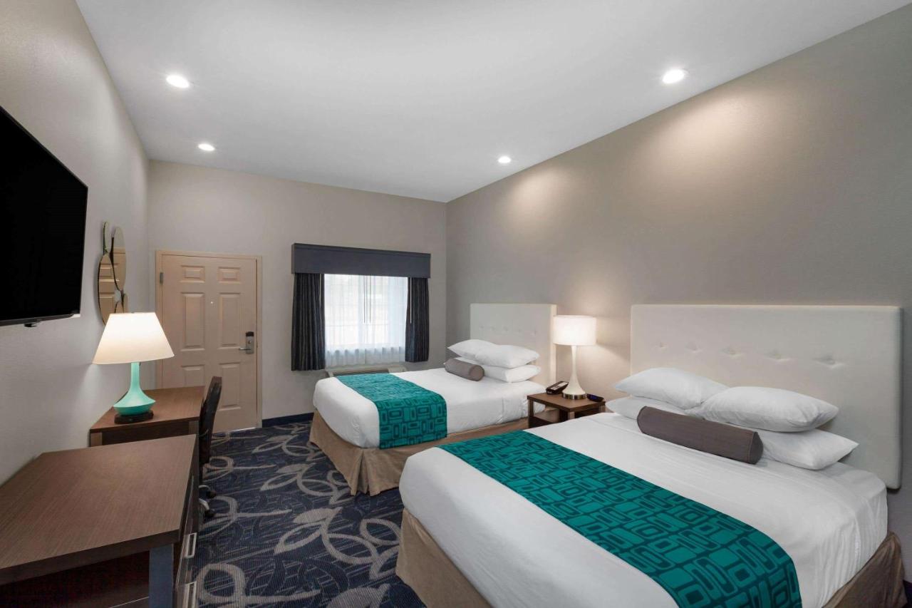 Queen Room with Two Queen Beds - Smoking at Americas Best Value Inn Houston Willowbrook