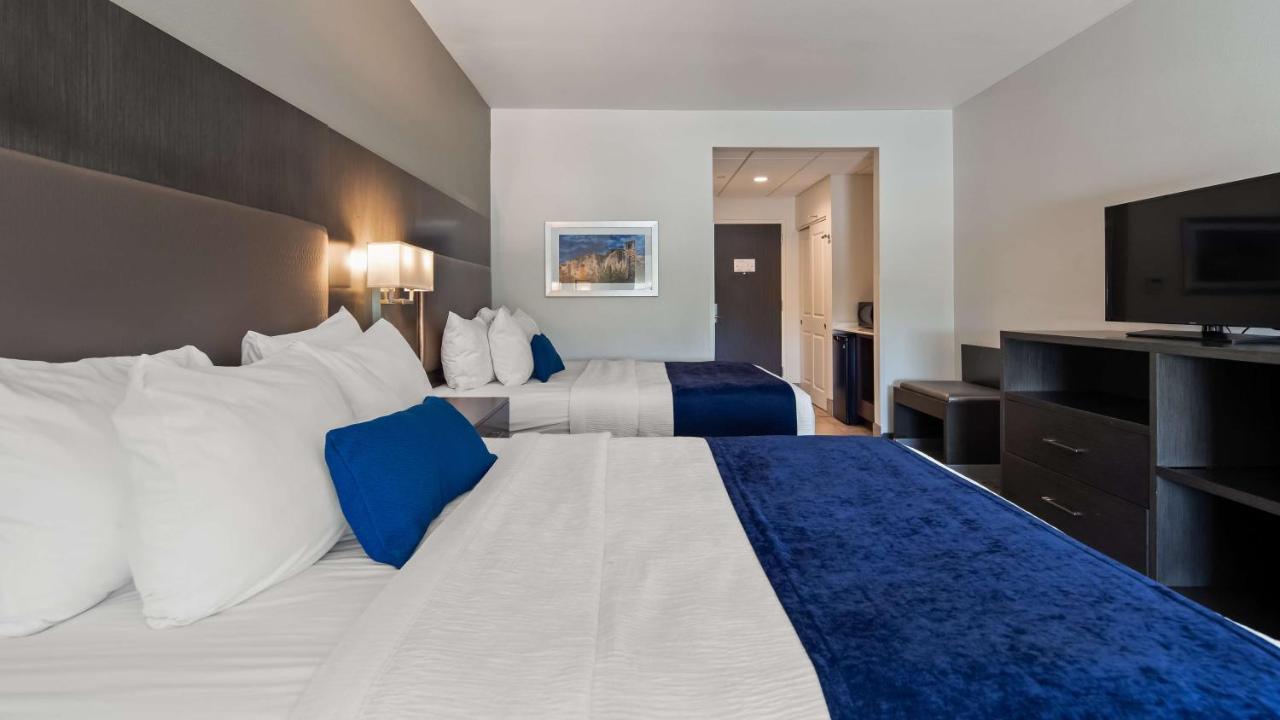 Queen Room with Two Queen Beds at Best Western Plus Roland Inn & Suites