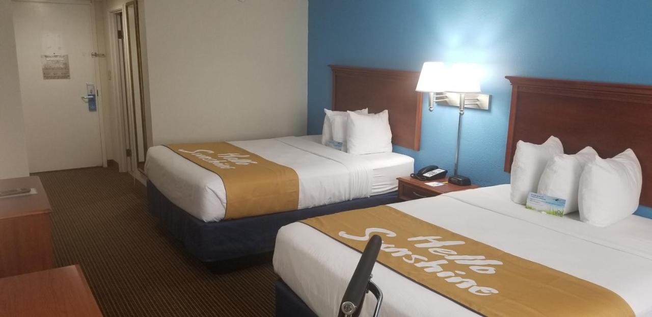 Queen Room with Two Queen Beds - Non-Smoking at Days Inn & Suites by Wyndham Tallahassee Conf Center I-10