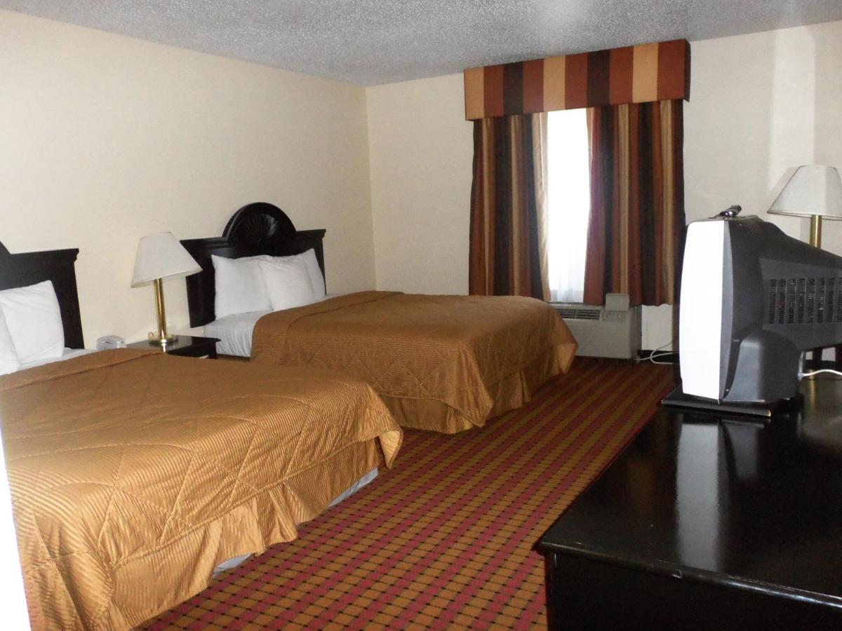 Queen Room with Two Queen Beds at Noble Suites
