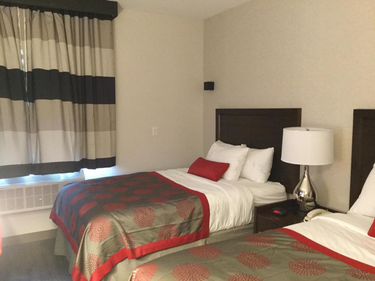 Double Room with Two Double Beds - Smoking at Ramada by Wyndham Bronx Terminal