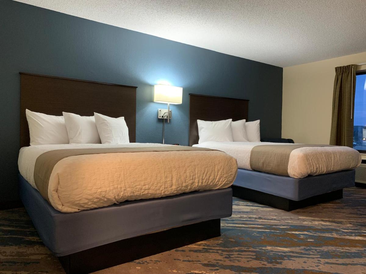 Queen Room with Two Queen Beds - Non-Smoking at AmericInn by Wyndham Prairie du Chien