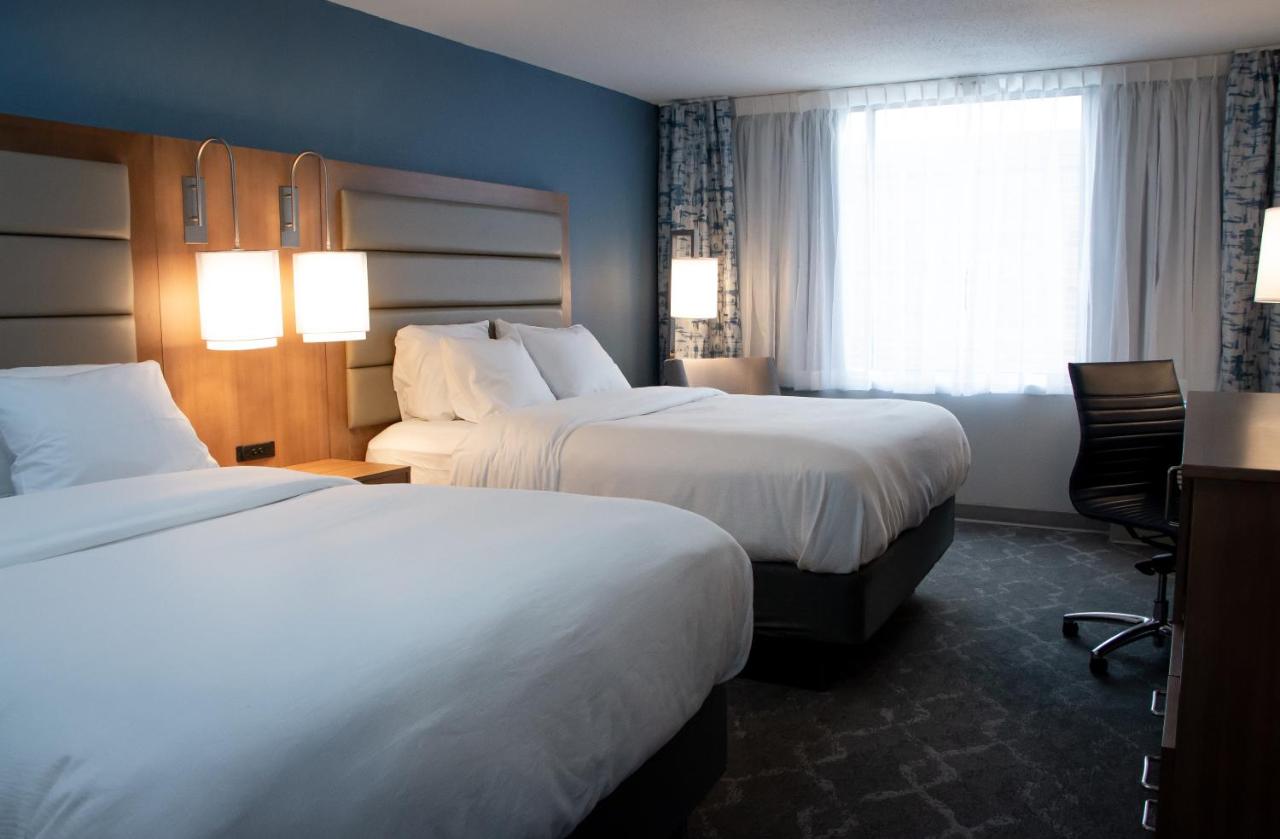 Queen Room with Two Queen Beds - Non-Smoking at Radisson Hotel and Conference Center Fond du Lac