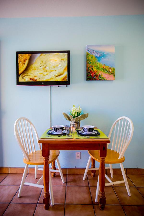 Queen Room with Two Queen Beds and Kitchenette at Leucadia Beach Inn