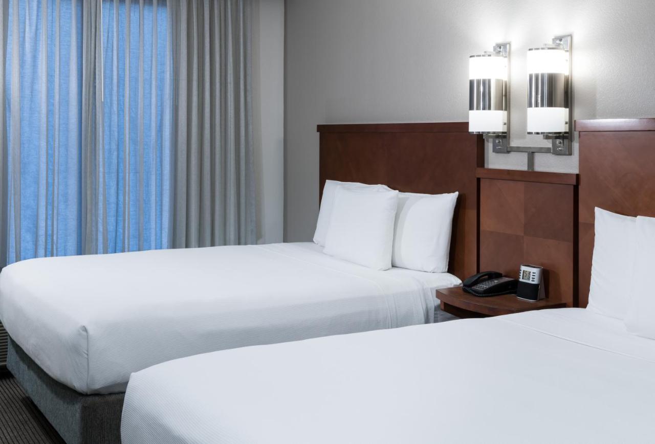 Deluxe Queen Room with Two Queen Beds and Sofa Bed - High Floor at Hyatt Place Jacksonville Airport