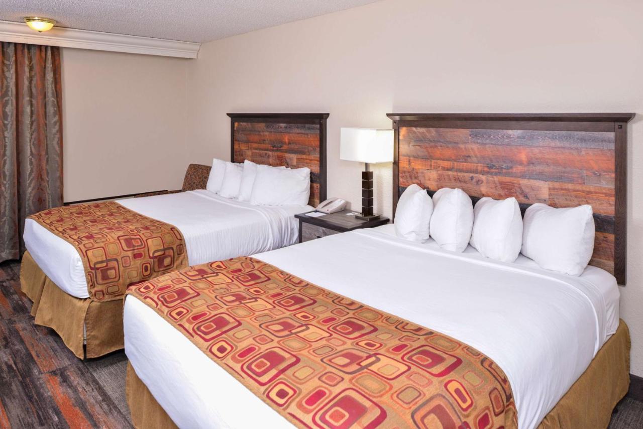 Queen Room with Two Queen Beds - Pool View at Best Western Kelly Inn