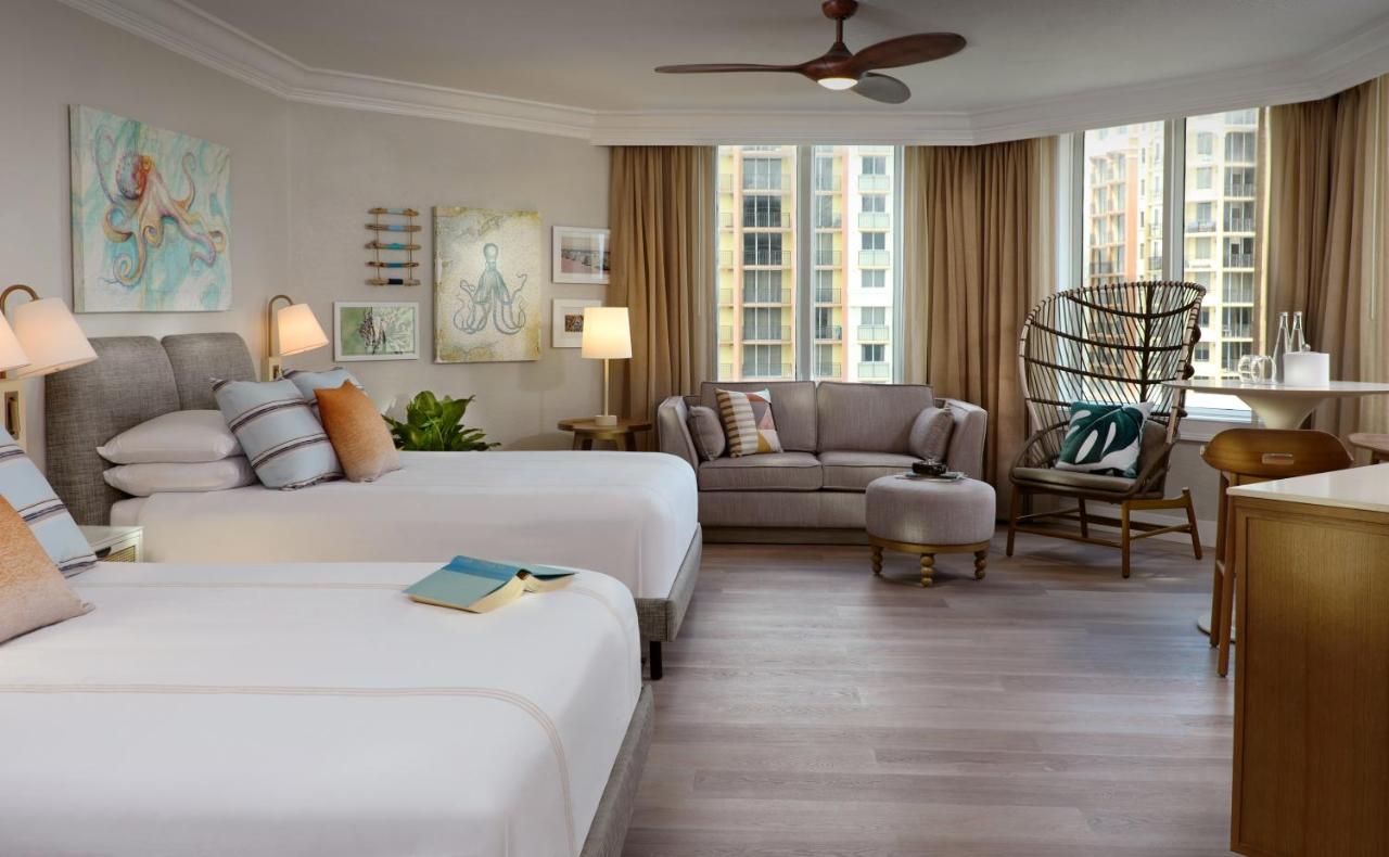 Quadruple Room at Pelican Grand Beach Resort - A Noble House Resort