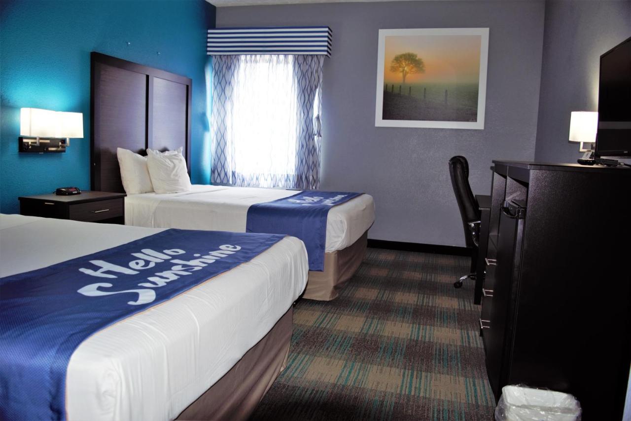 Queen Room with Two Queen Beds - Smoking at Days Inn by Wyndham Montgomery