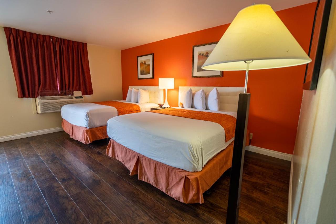 Deluxe Queen Room with Two Queen Beds - Non-Smoking at Howard Johnson by Wyndham Buena Park