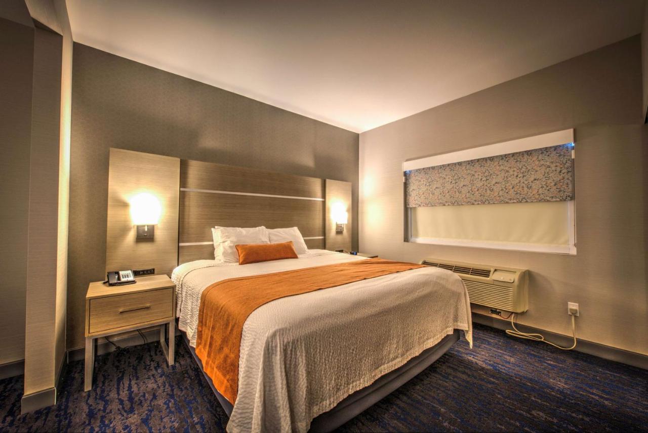 King Room with Mobility Accessible Tub and Sofa Bed at Best Western Plus Media Center Inn & Suites