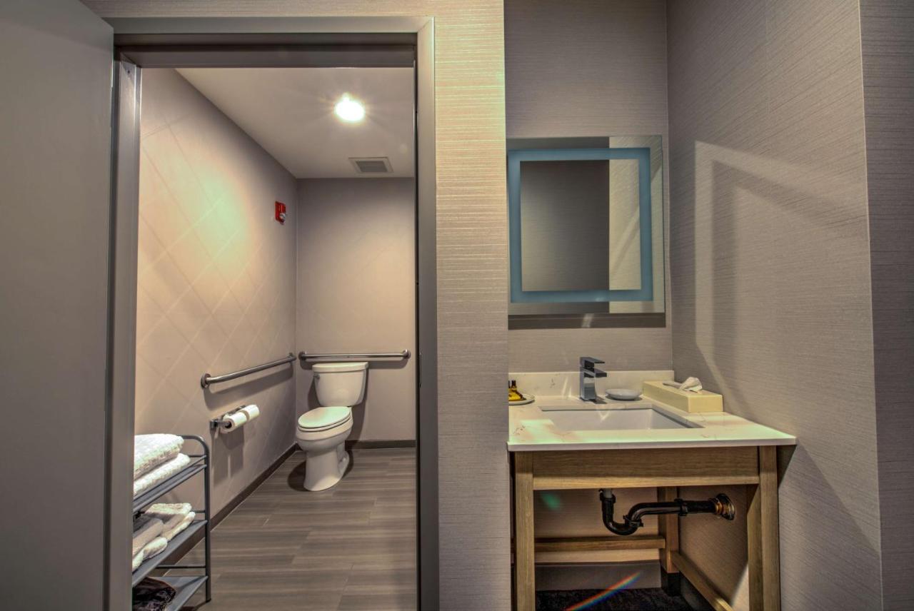 King Room with Mobility Accessible Tub and Sofa Bed at Best Western Plus Media Center Inn & Suites
