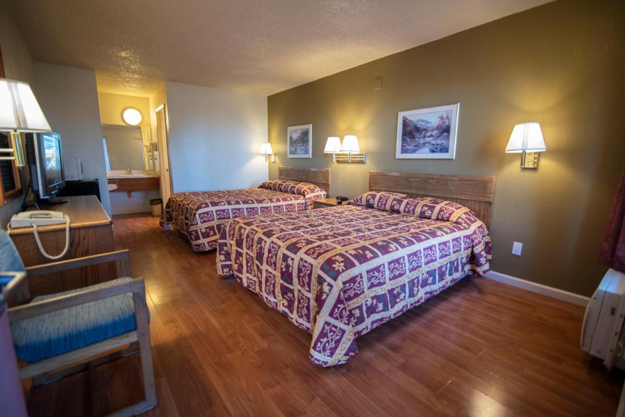 Queen Room with Two Queen Beds - Non-Smoking at National 9 Inn