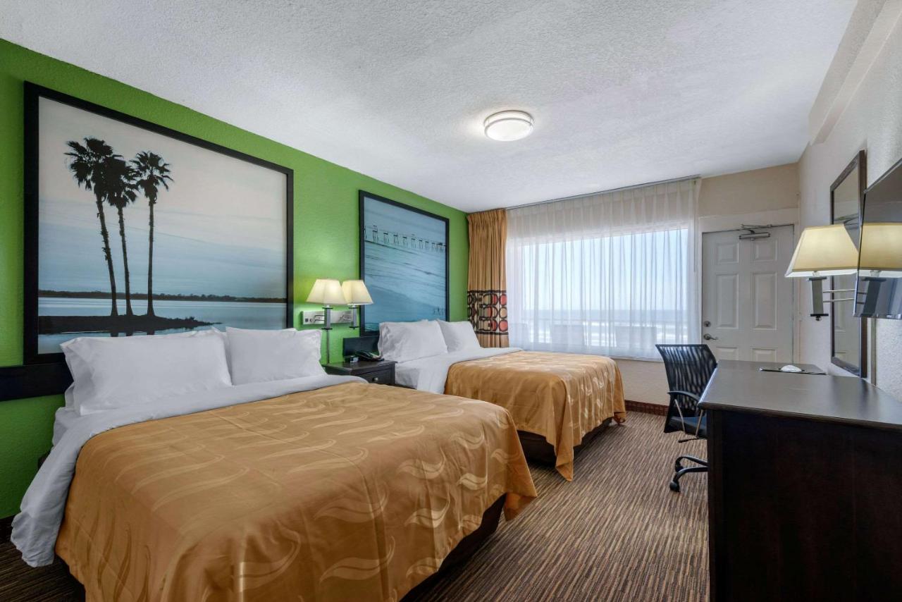 One King and Two Queen Beds with Ocean View at Quality Inn Daytona Beach Oceanfront