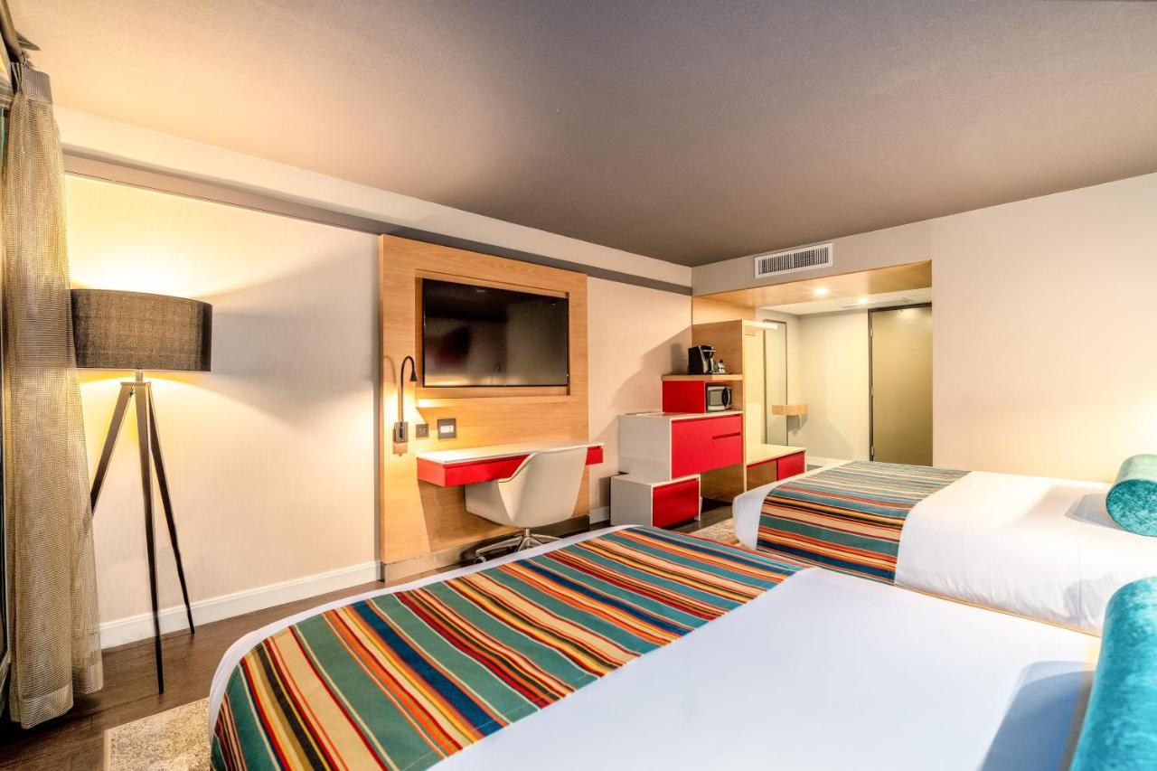 Standard Double Room with Two Queen Beds at Century Park Hotel