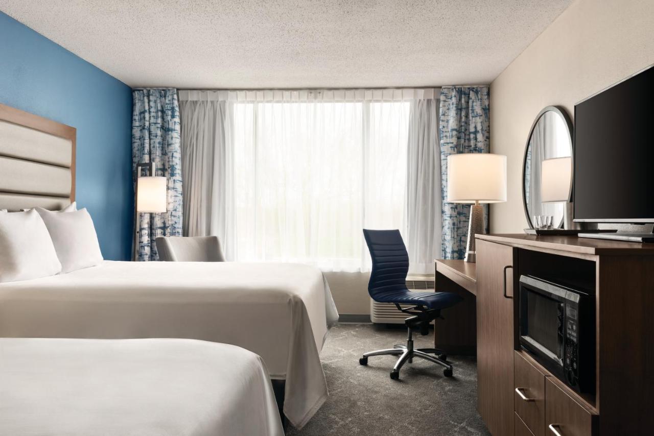 Queen Room with Two Queen Beds - Non-Smoking at Radisson Hotel and Conference Center Fond du Lac