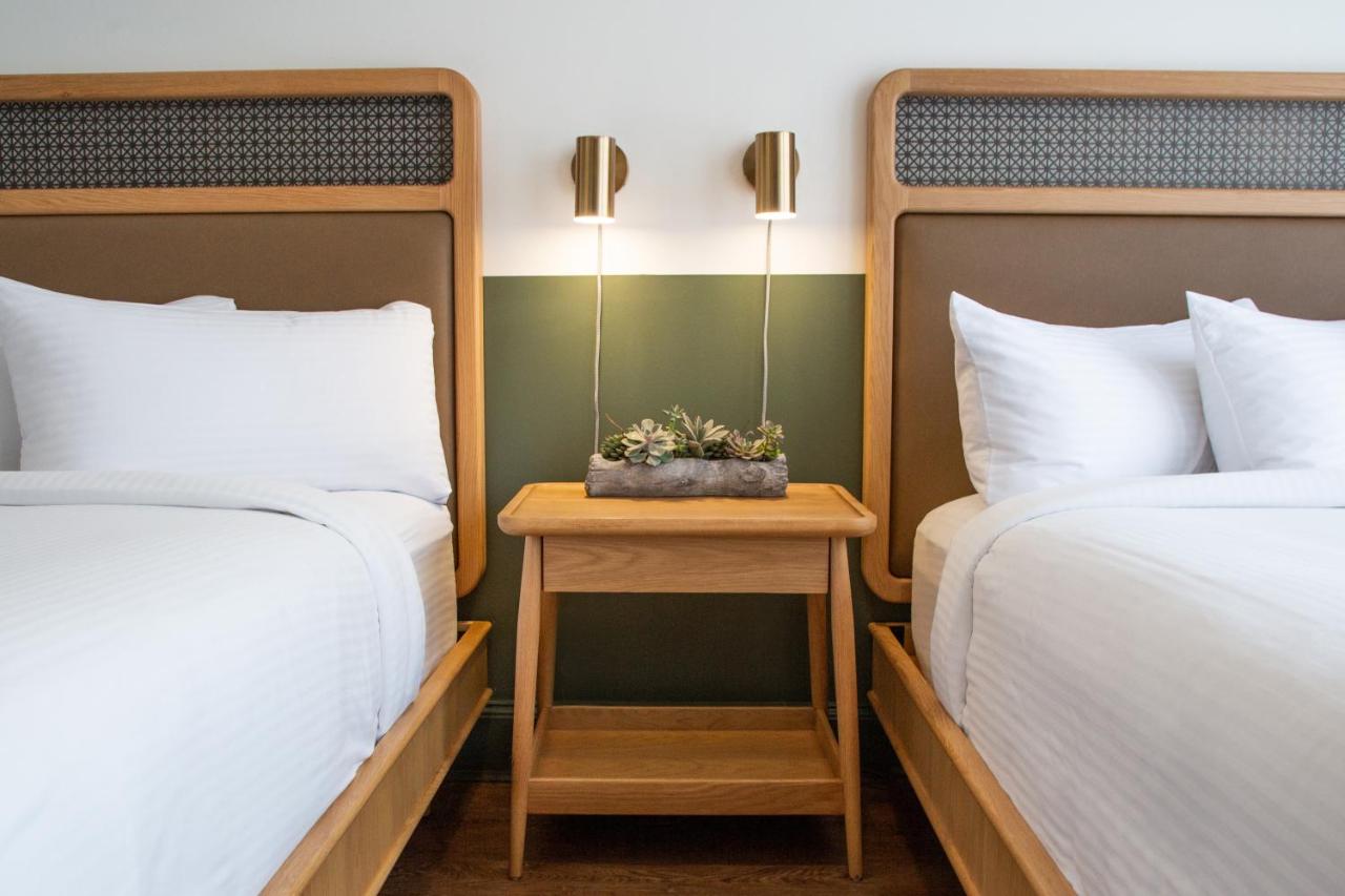 Standard Queen Room with Two Queen Beds at Hotel Theo New Orleans, Tapestry Collection by Hilton