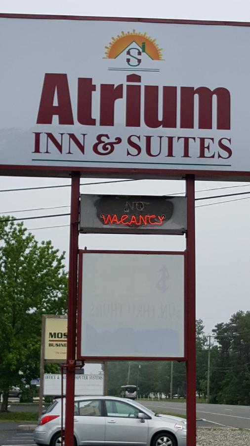 | Atrium Inn & Suites