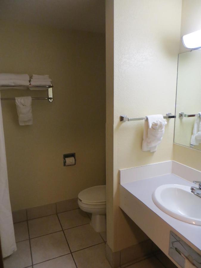 Two-Room King Suite - Courtside - Non-Smoking at Super 8 by Wyndham Bridgeview of Mackinaw City