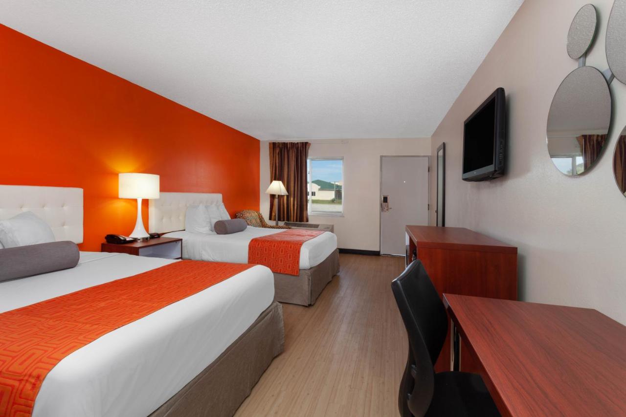 Queen Room with Two Queen Beds at Howard Johnson by Wyndham Vero Beach/I-95