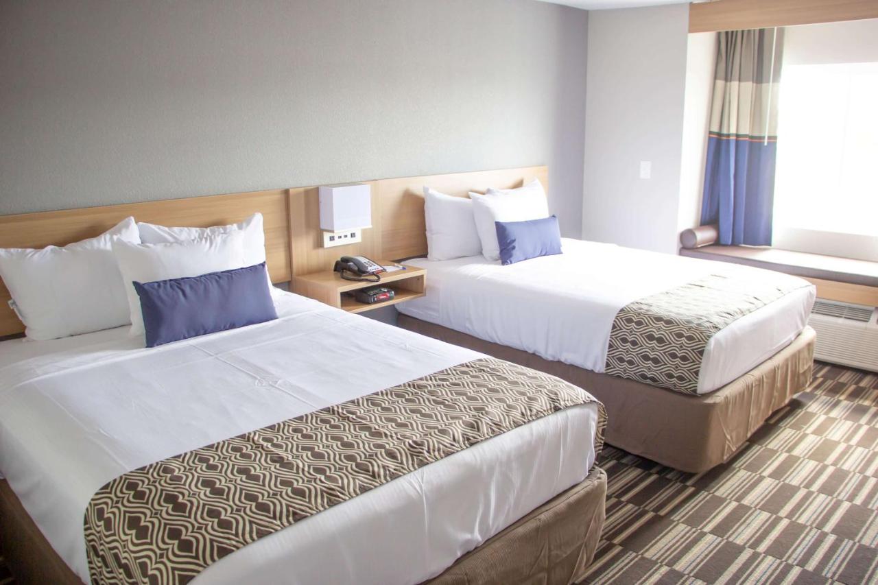Queen Room with Two Queen Beds - Non-Smoking at Microtel Inn & Suites by Wyndham Camp Lejeune/Jacksonville