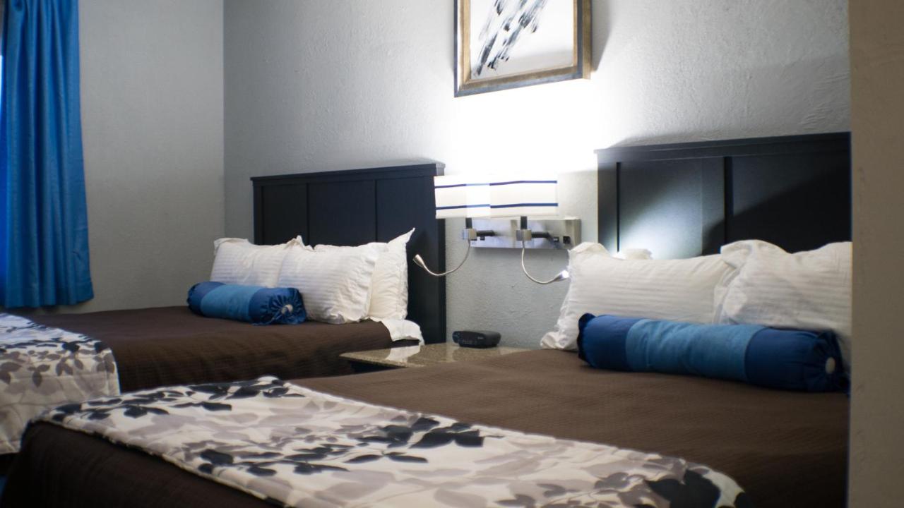 Queen Room with Two Queen Beds - Interior Corridor at Rodeway Inn & Suites Nampa