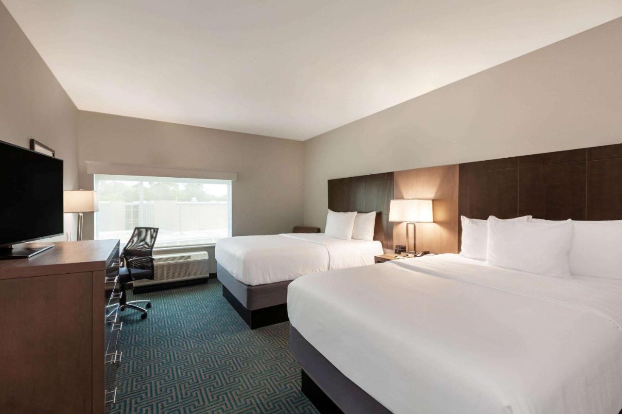 Queen Room with Two Queen Beds - Non-Smoking at La Quinta Inn & Suites by Wyndham Lafayette Oil Center