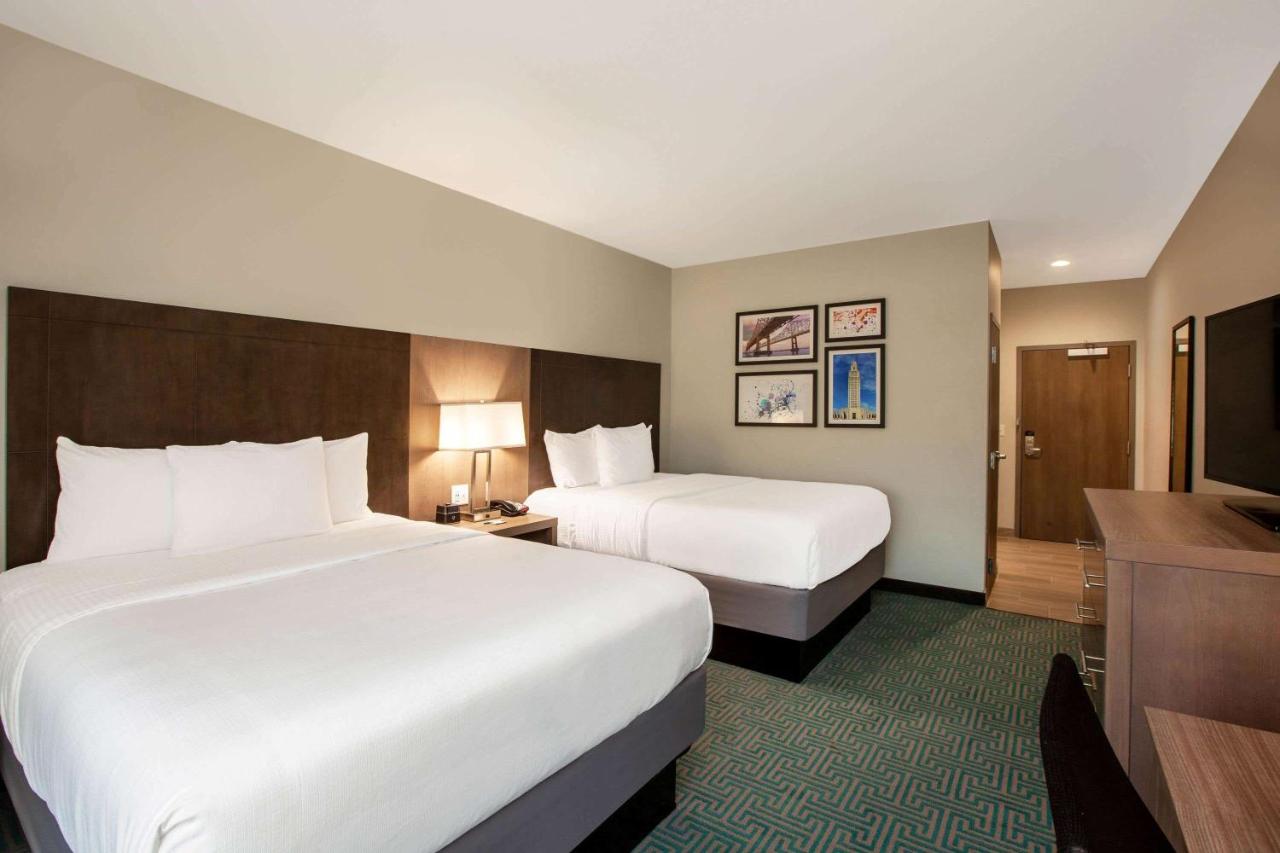 Queen Room with Two Queen Beds and Mobility/Hearing Access - Non-Smoking at La Quinta Inn & Suites by Wyndham Lafayette Oil Center
