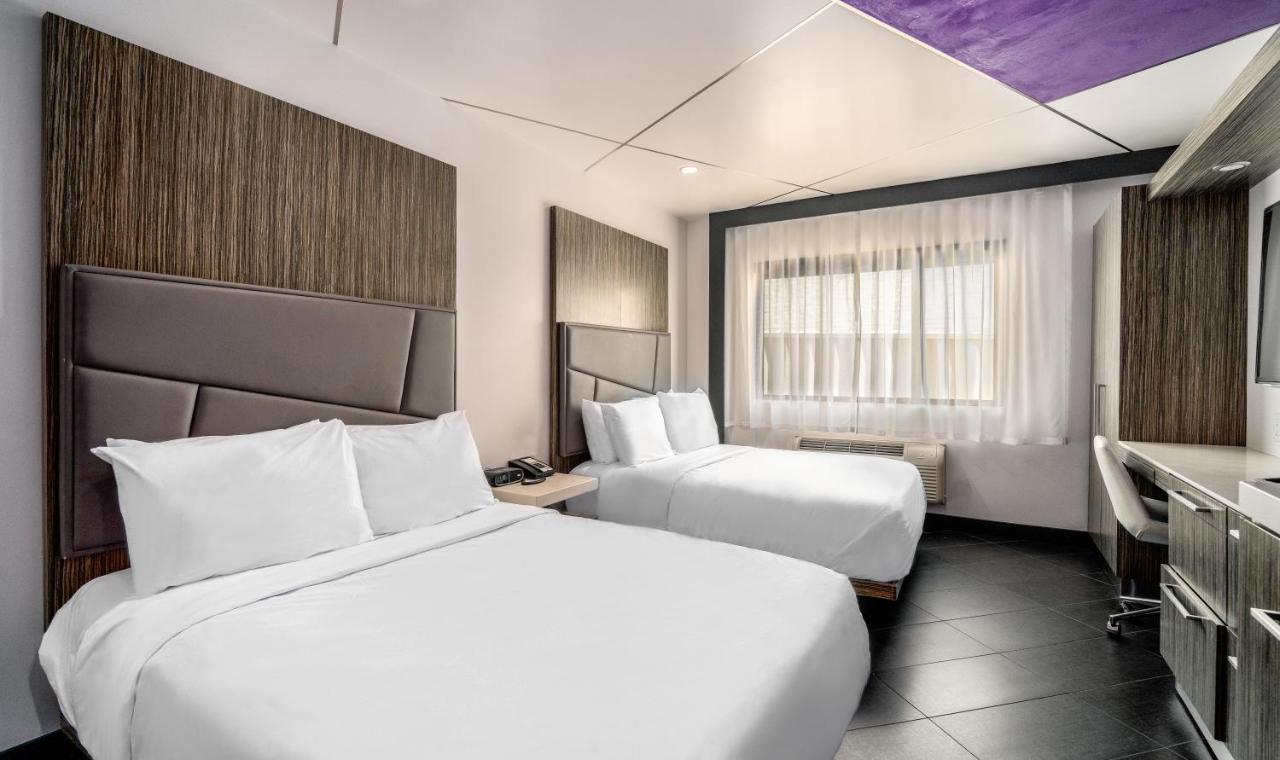 Double Room with Two Double Beds at The Moment Hotel