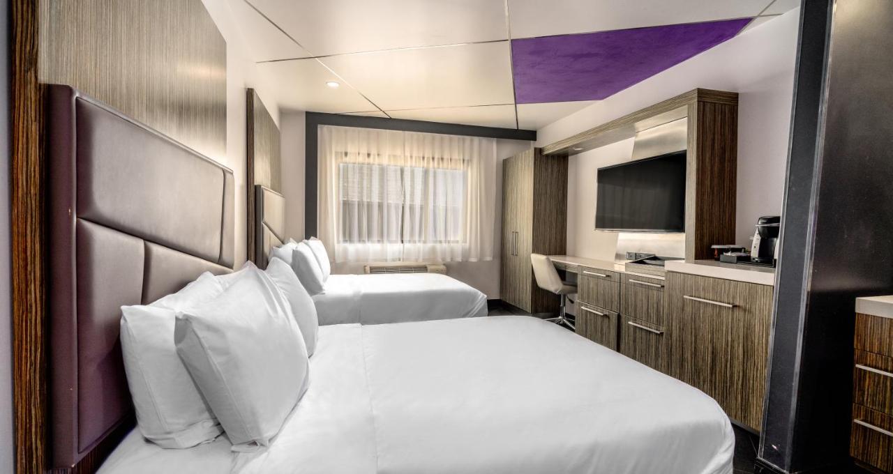 Double Room with Two Double Beds at The Moment Hotel