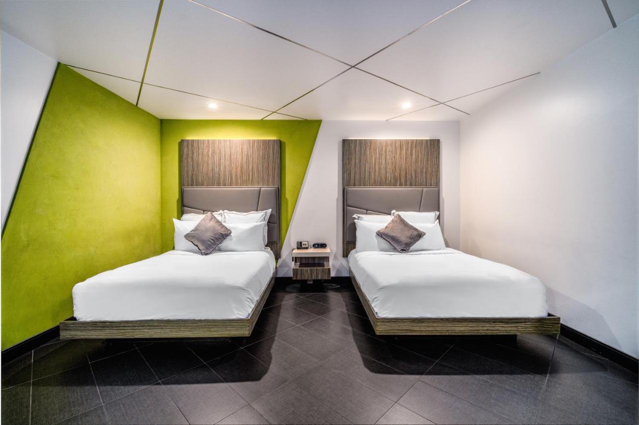 Double Room with Two Double Beds at The Moment Hotel