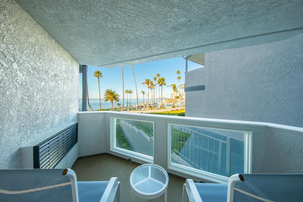 Queen Room with Two Queen Beds and Partial Ocean View at SeaCrest OceanFront Hotel