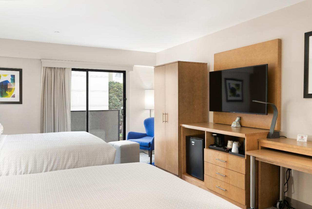 Queen Room with Two Queen Beds and Patio at Best Western Red Coach Inn